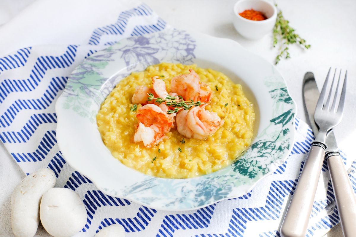 Ризотто «Альтомонте» на фирменном рыбном бульоне с тигровыми креветками и шафраном